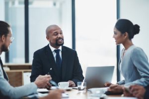 Business leaders discussing franchise expansion strategy in African markets