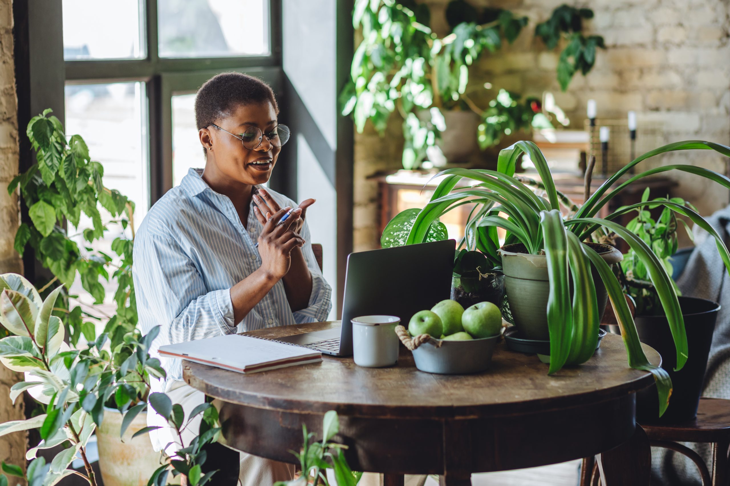 African professional working on health and beauty franchise planning in Africa