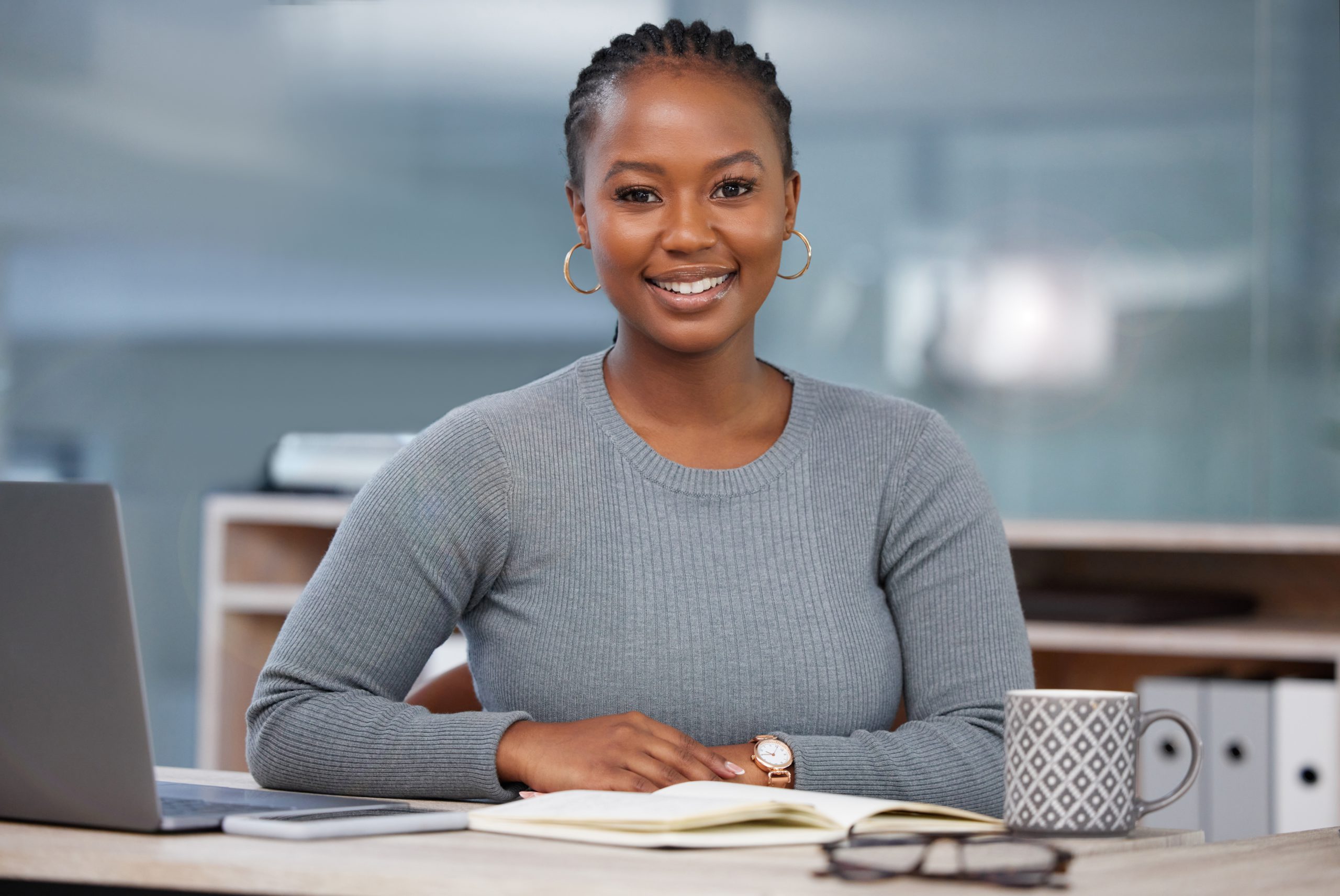 African businesswoman reviewing health and beauty franchise opportunities in Africa